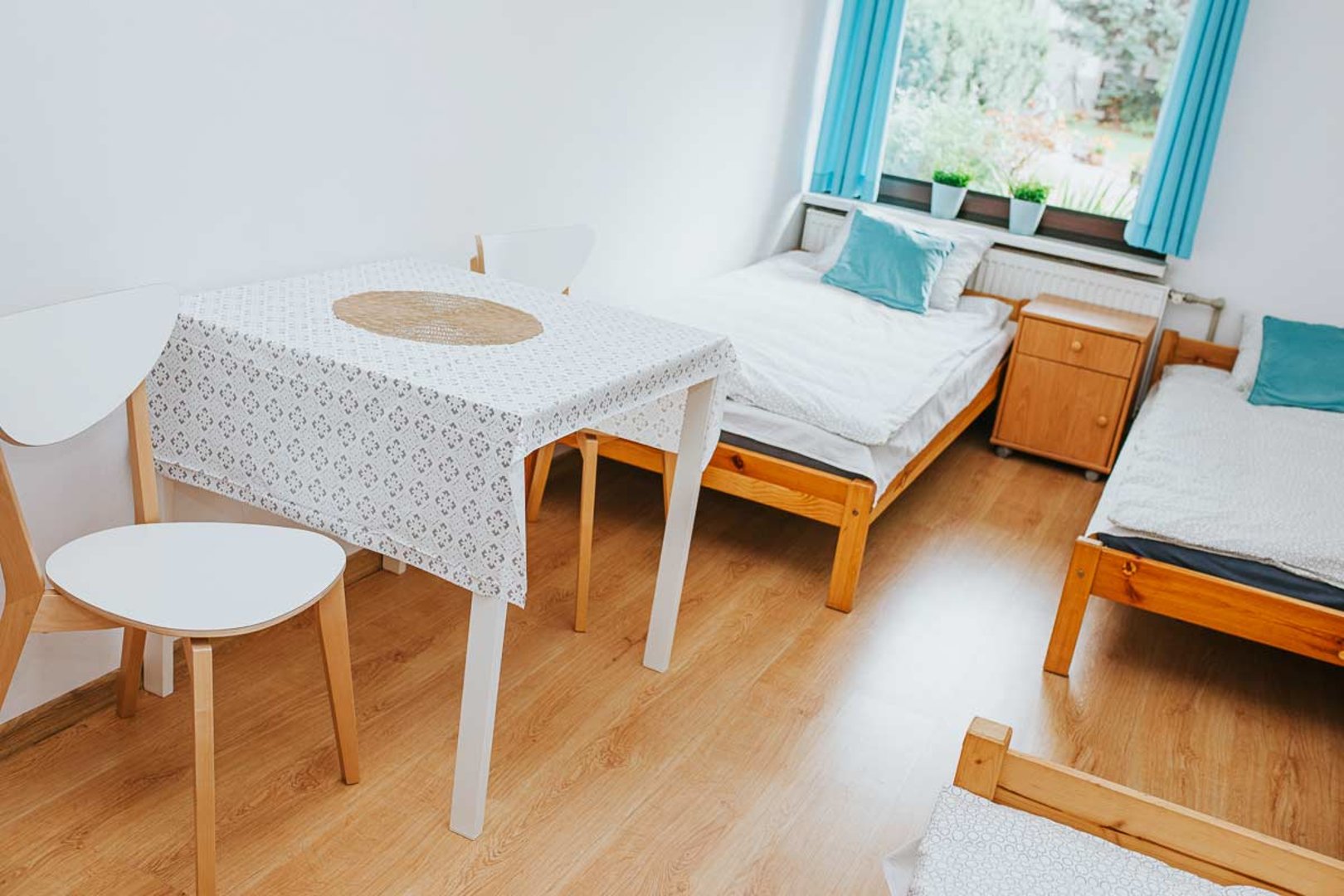 Трехместный номер с общей ванной комнатой